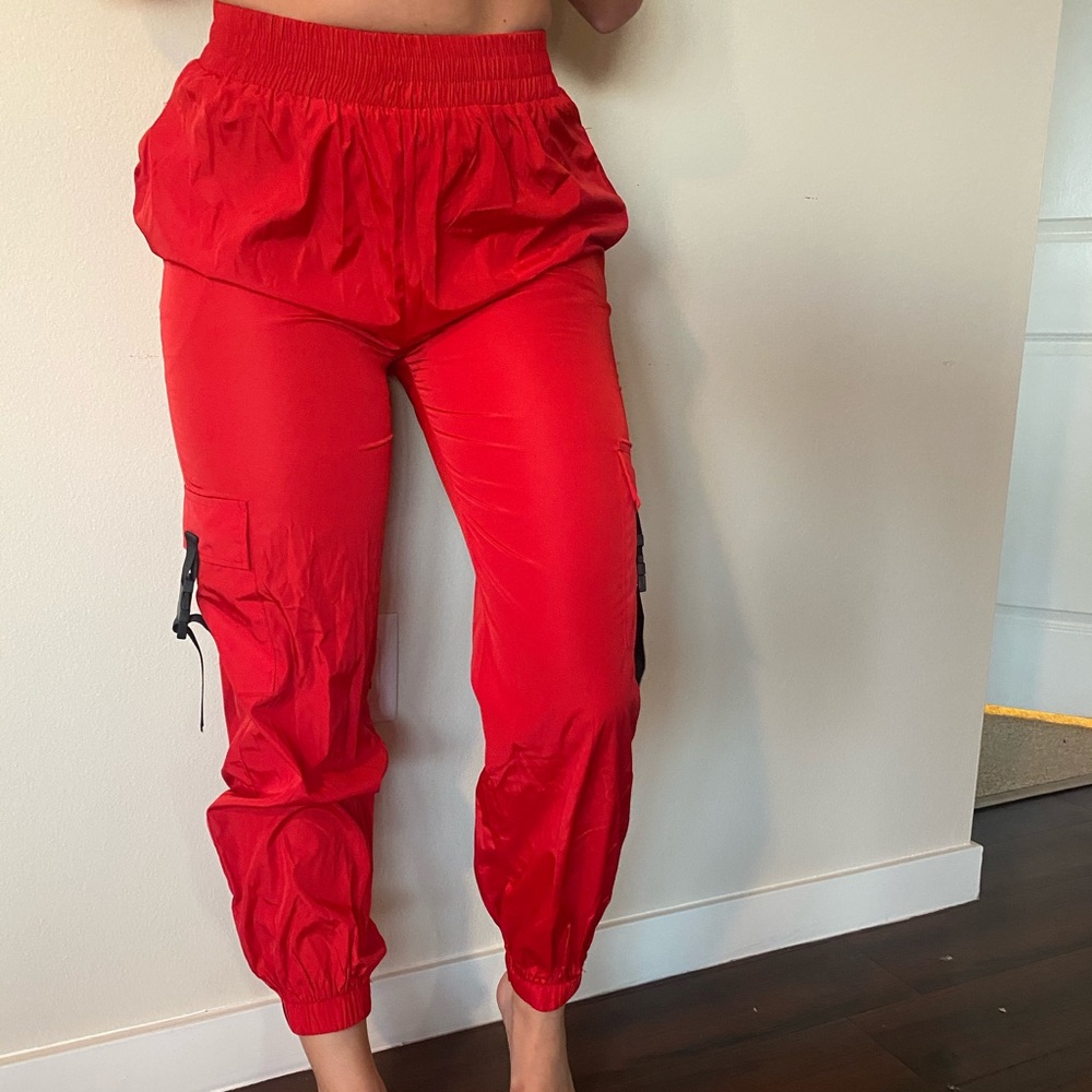 Red windbreaker/joggers